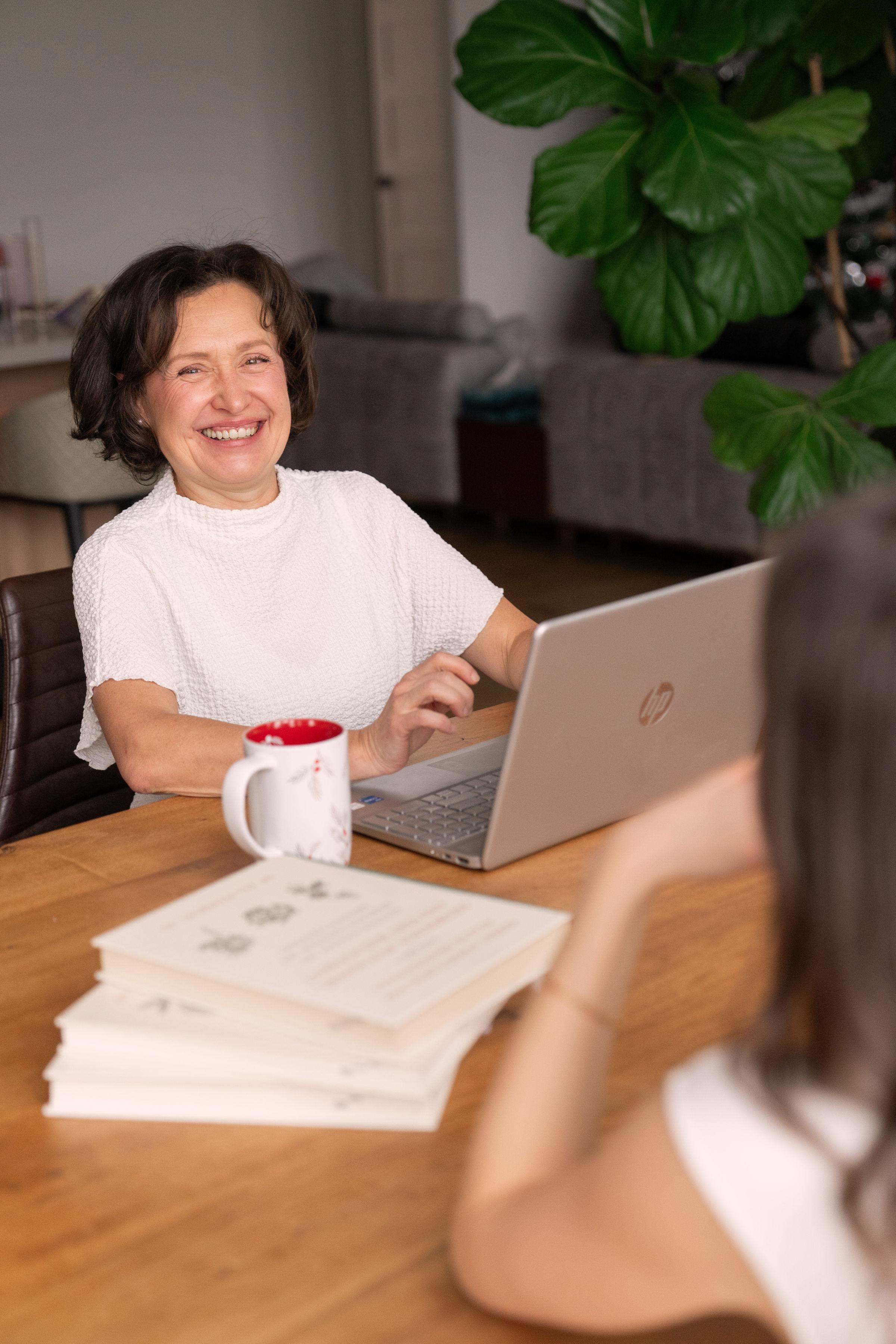 Marina smiling during a wellness consultation